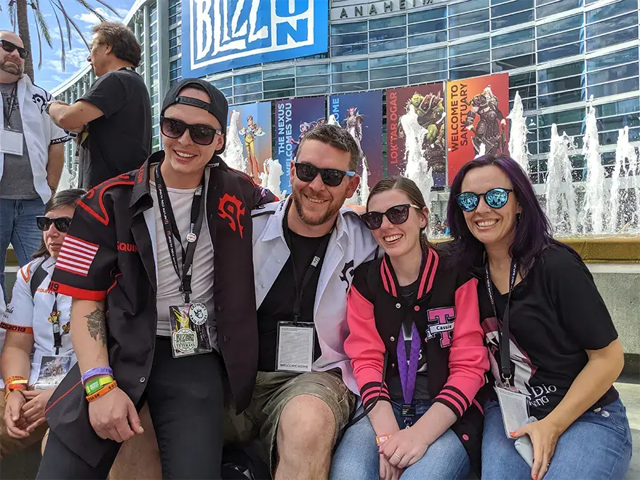 Club Tito's members sitting in front of the fountain at the Anaheim Convention Center during Blizzcon